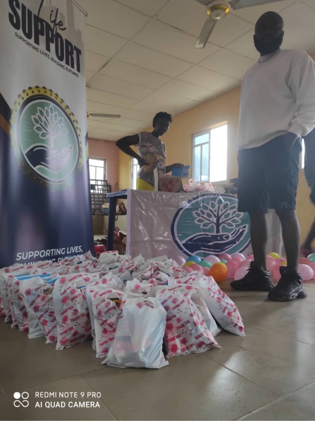 Children with gift bags at the outreach event