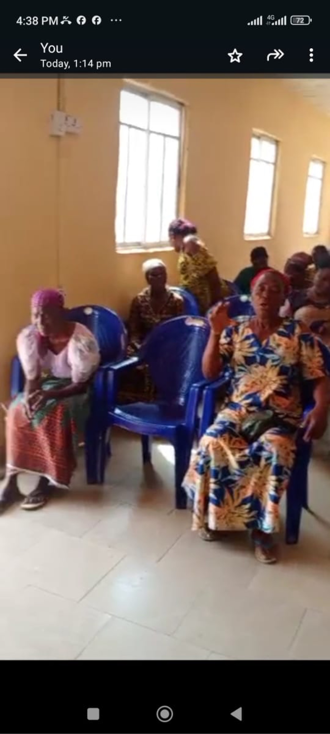 Women seated at outreach event